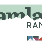 Tamlar Range logo with title text with white mountain outlines